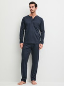 Men model is wearing Pyjamas made of 100% Cotton in Blue, Patterned from the EDITION 85 series by CALIDA, Front view
