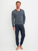 Men model is wearing Pyjama with cuff made of 100% Cotton in Blue, Patterned from the Cotton Special series by CALIDA, Front view