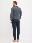 Men model is wearing Pyjama with cuff made of 100% Cotton in Blue, Patterned from the Cotton Special series by CALIDA, Back view
