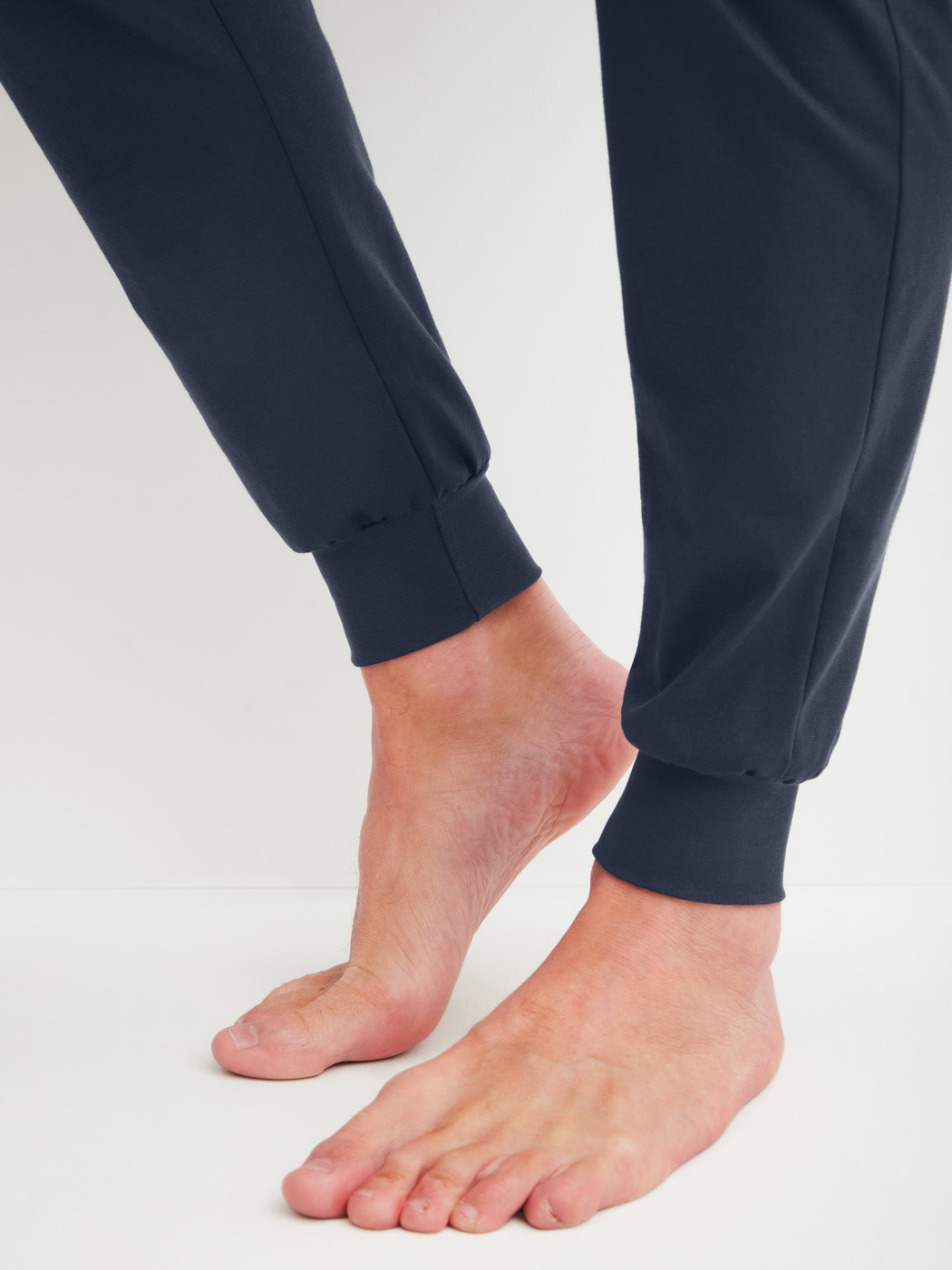 Men model is wearing Pyjama with cuff made of 100% Cotton in Blue, Patterned from the Cotton Special series by CALIDA, Detail