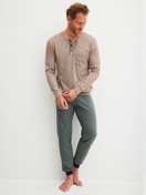 Men model is wearing cuffed pyjamas made of 100% Cotton in Blue, Patterned from the Relax Choice 1 series by CALIDA, Front view
