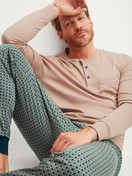 Men model is wearing cuffed pyjamas made of 100% Cotton in Blue, Patterned from the Relax Choice 1 series by CALIDA, Front view