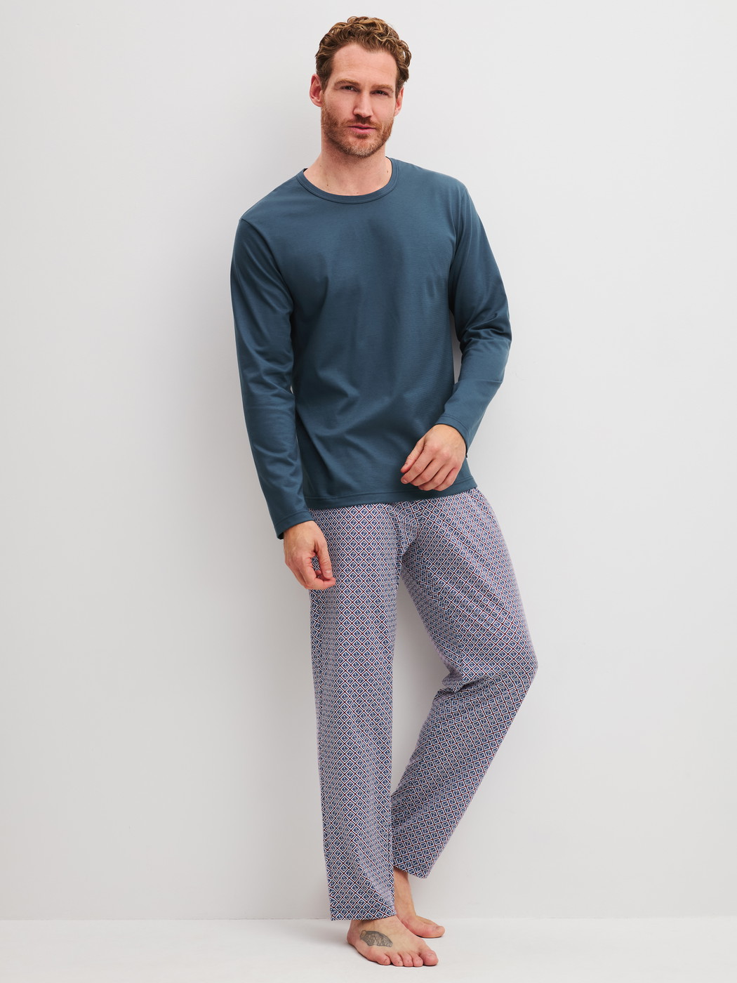 Men model is wearing Pyjama made of 100% Cotton in Blue, Patterned from the Cotton Special series by CALIDA, Front view
