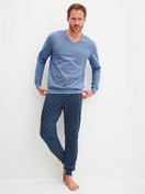 Men model is wearing Pyjama with cuff made of 100% Cotton in Blue, Patterned from the Relax Imprint 2 series by CALIDA, Front view