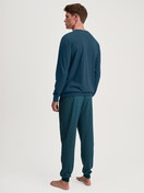 Men model is wearing Pyjama with cuff made of 100% Cotton in Turquoise, Patterned from the Relax Imprint 3 series by CALIDA, Back view