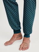 Men model is wearing Pyjama with cuff made of 100% Cotton in Turquoise, Patterned from the Relax Imprint 3 series by CALIDA, Detail