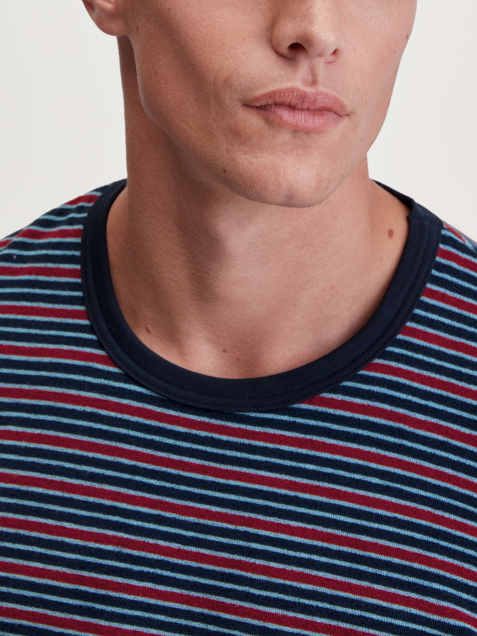 Men model is wearing Pyjama with cuff made of Cotton in Red, Striped from the Relax Terry series by CALIDA, Detail