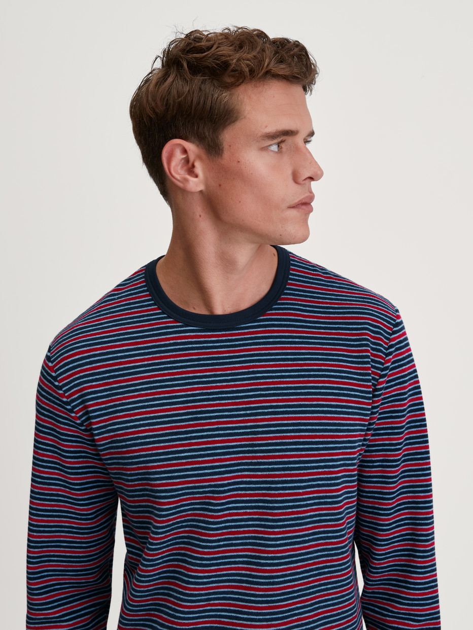 Men model is wearing Pyjama with cuff made of Cotton in Red, Striped from the Relax Terry series by CALIDA, Additional Image