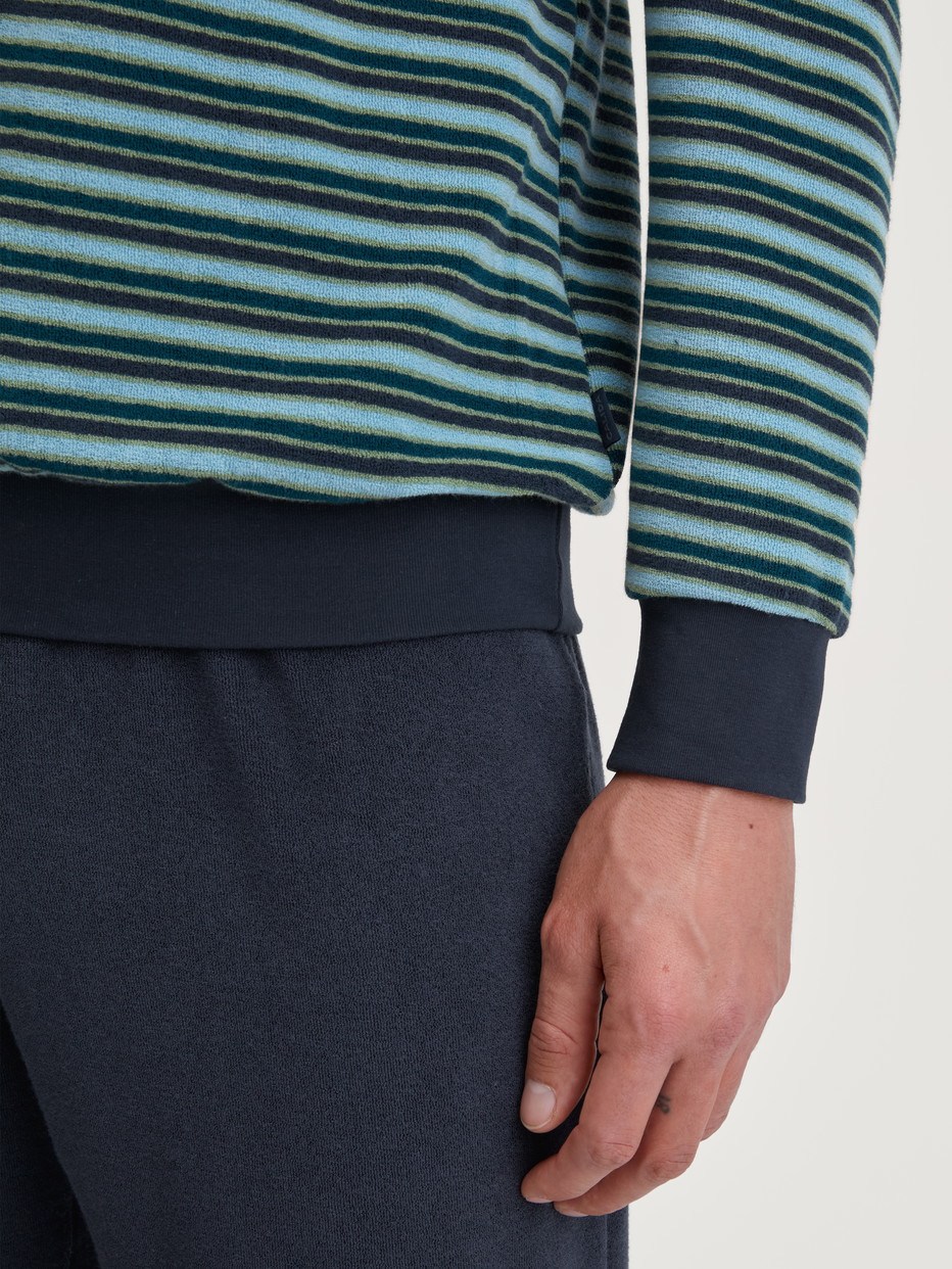 Men model is wearing Pyjama with cuff made of Cotton in Blue, Striped from the Relax Terry series by CALIDA, Detail