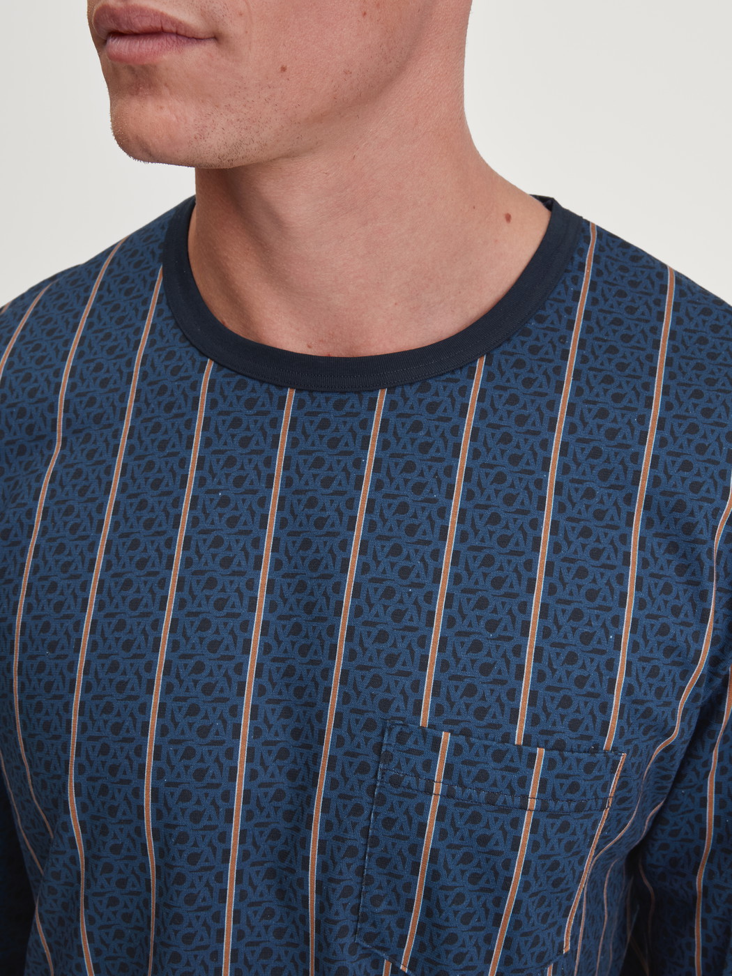 Men model is wearing Pyjama with cuff made of 100% Cotton in Blue, Striped from the Relax Imprint 1 series by CALIDA, Detail