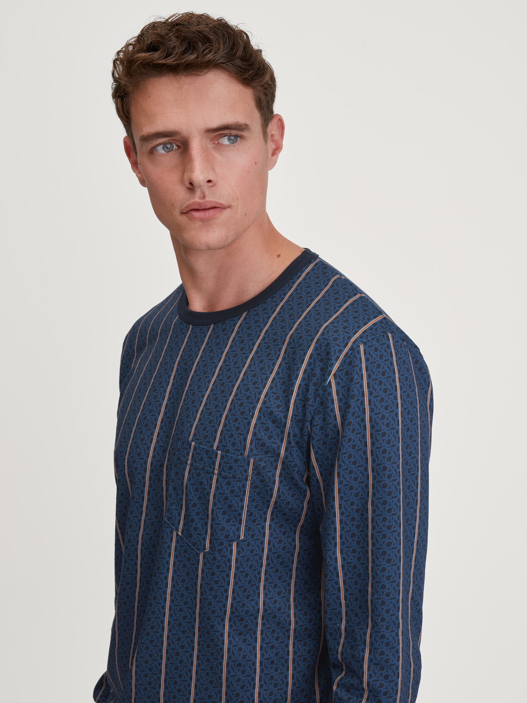 Men model is wearing Pyjama with cuff made of 100% Cotton in Blue, Striped from the Relax Imprint 1 series by CALIDA, Additional Image