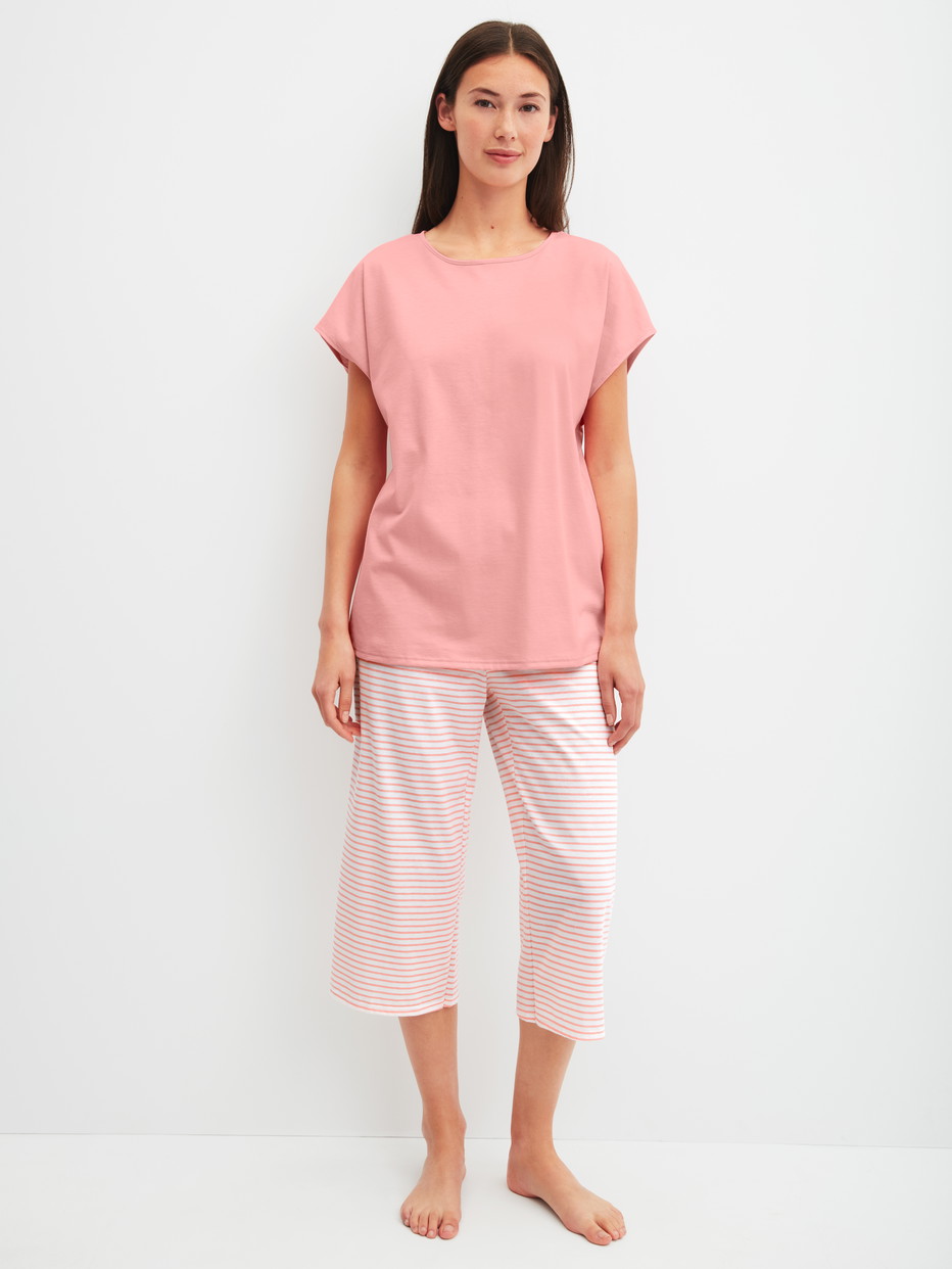 Le mannequin Femme porte le/la Pyjama capri en 100% coton de couleur Orange, À motifs, de la série Lovely Nights de CALIDA, Vue de face