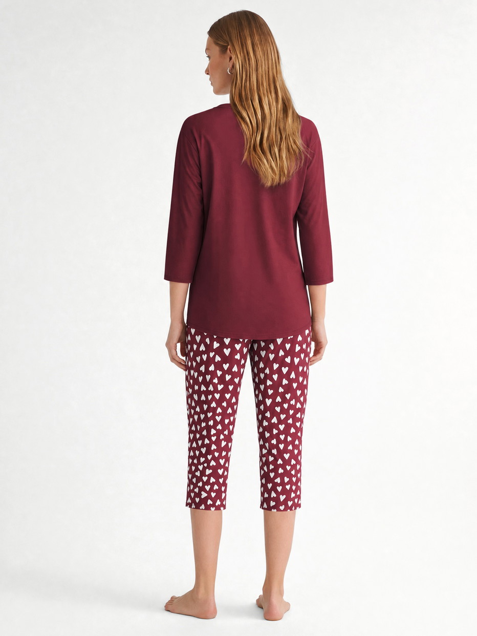 Le mannequin Femme porte le/la Pyjama capri en 100% coton de couleur Rouge, À motifs, de la série Cotton Special de CALIDA, Vue arrière