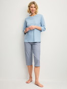 Women model is wearing Capri Pyjama made of 100% Cotton in Grey, Patterned from the Cotton Special series by CALIDA, Front view