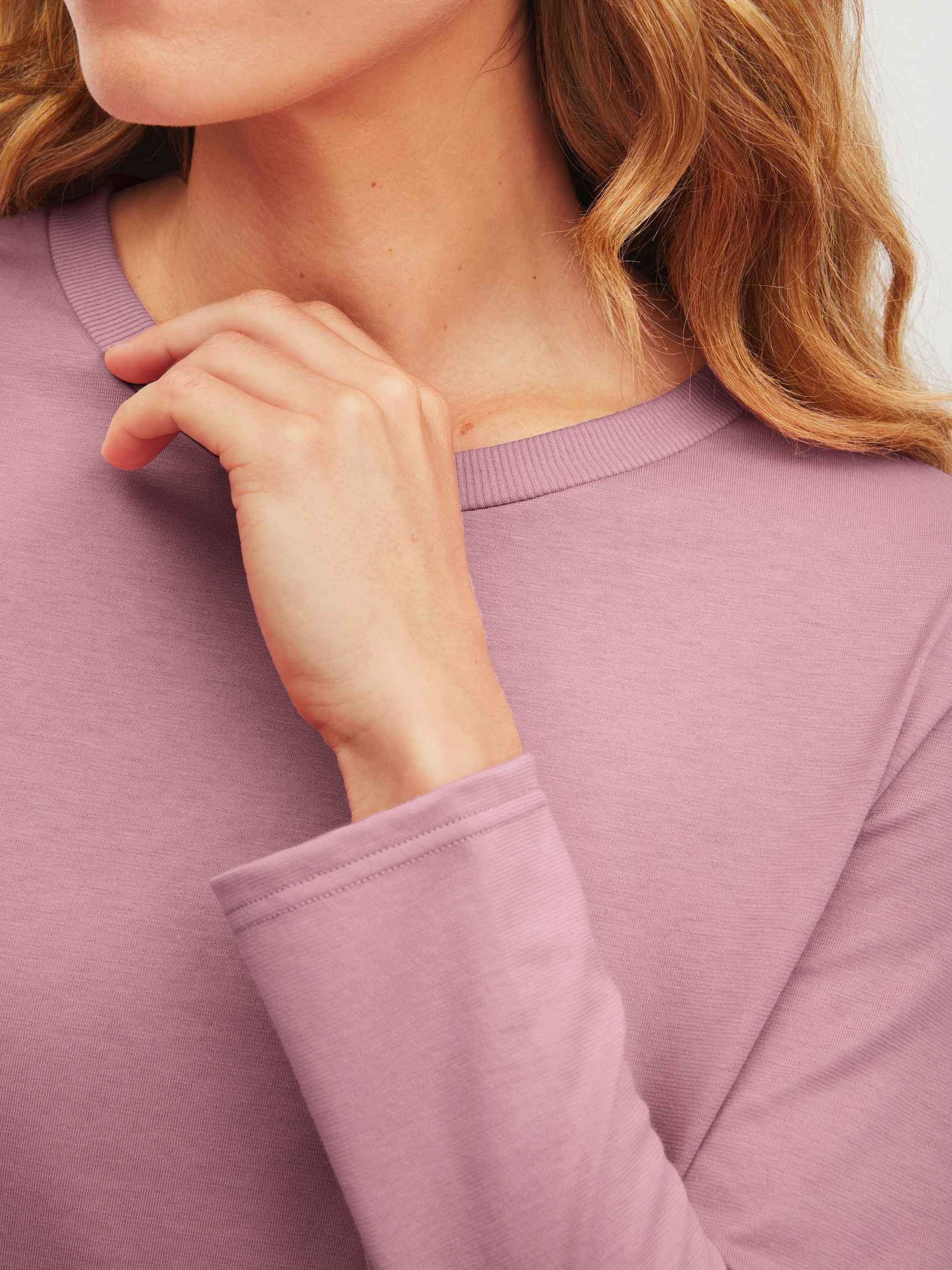 Women model is wearing Pyjamas, long made of 100% Cotton in Pink, Patterned from the Cotton Special series by CALIDA, Detail