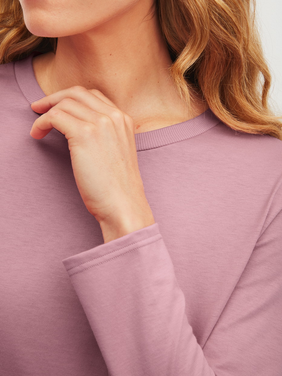 Women model is wearing Pyjamas, long made of 100% Cotton in Pink, Patterned from the Cotton Special series by CALIDA, Detail