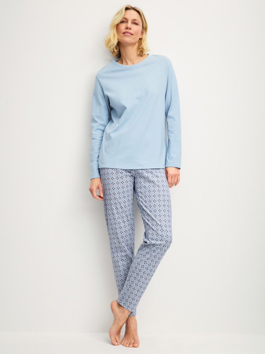 Women model is wearing Pyjamas, long made of 100% Cotton in Grey, Patterned from the Cotton Special series by CALIDA, Front view