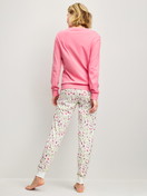 Women model is wearing Pyjama with cuff made of 100% Cotton in Pink, Patterned from the Cotton Special series by CALIDA, Back view