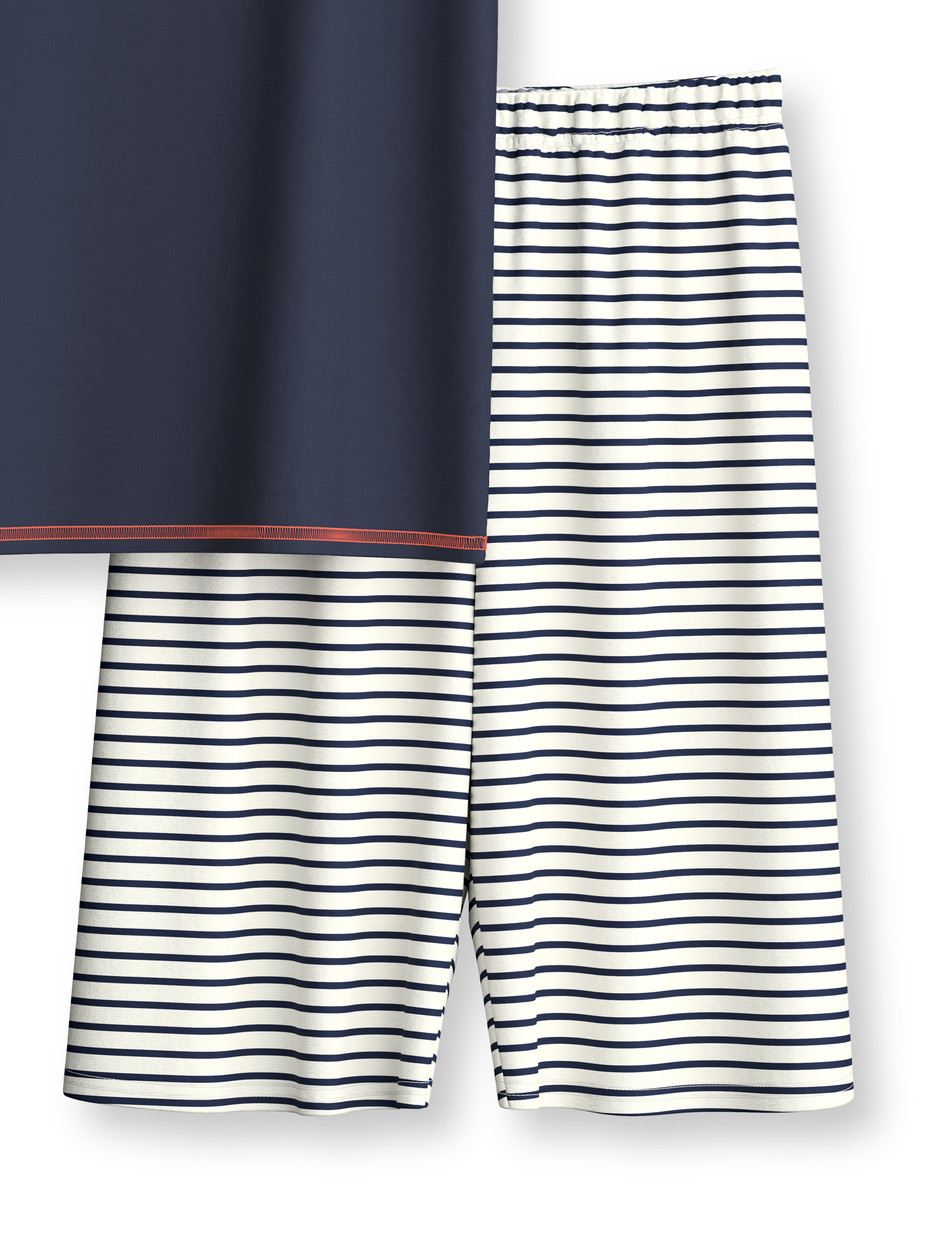Figli - Pigiama corto in puro cotone organico in 100% cotone di colore Blu, Modello, della serie Kids Surf di CALIDA, Vista frontale, Sfondo bianco