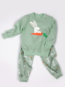 Kids model is wearing Pyjama with cuff made of 100% Cotton in Green, Patterned from the Toddlers Easter series by CALIDA, Additional Image