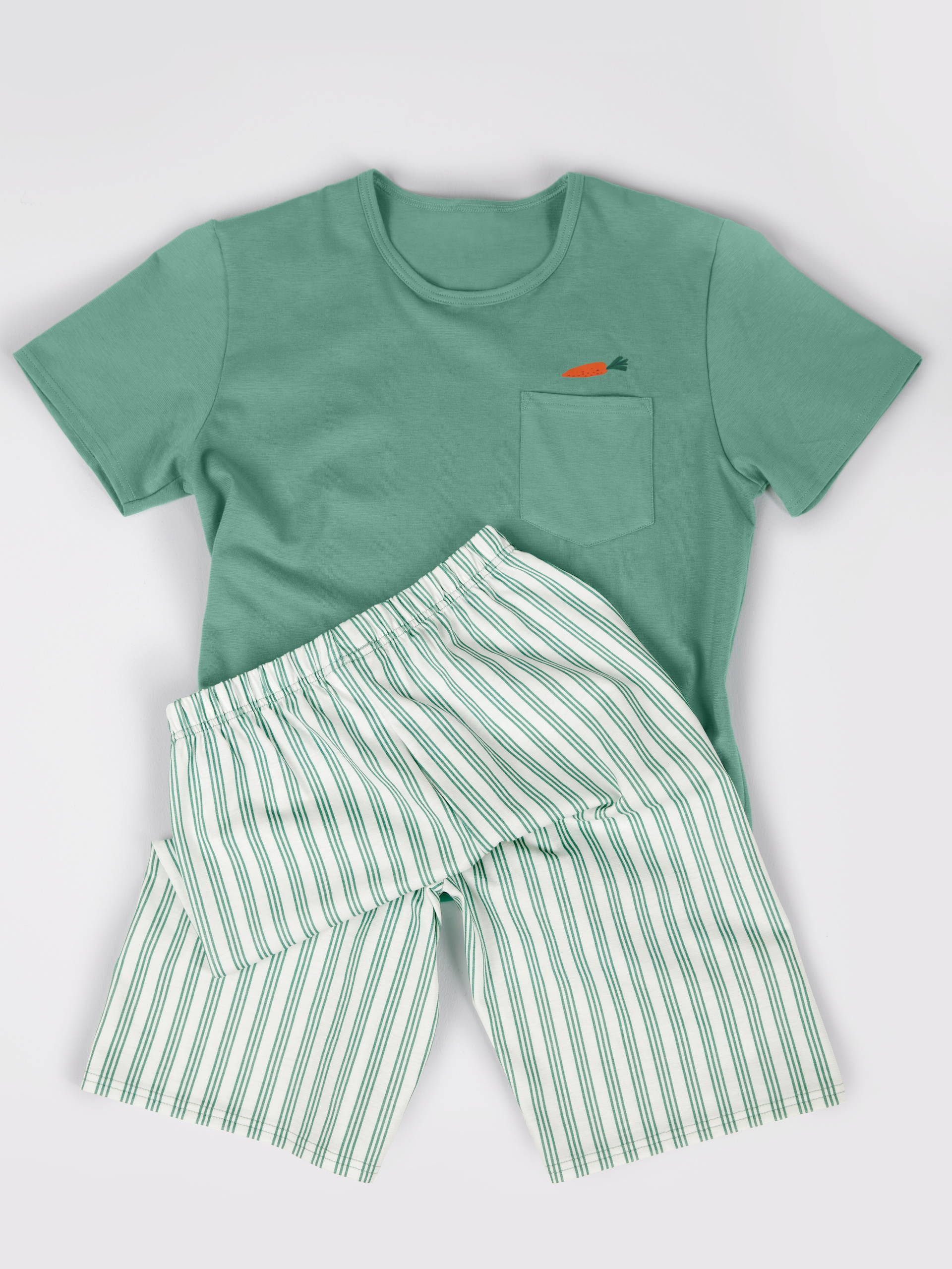 Kinder-Model trägt Kurz-Pyjama aus 100% Baumwolle in Grün, Gemustert aus Serie Kids Easter von CALIDA, Zusatzbild
