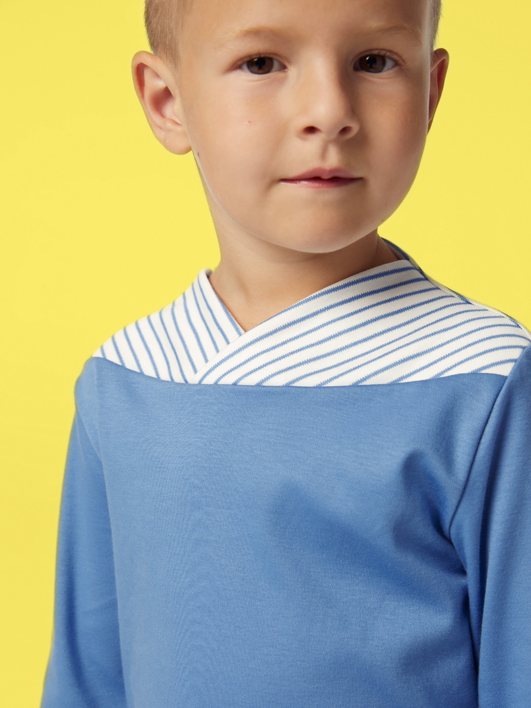 Kids model is wearing Pyjama with cuff made of 100% Cotton in Blue,  from the Toddlers Youngster series by CALIDA