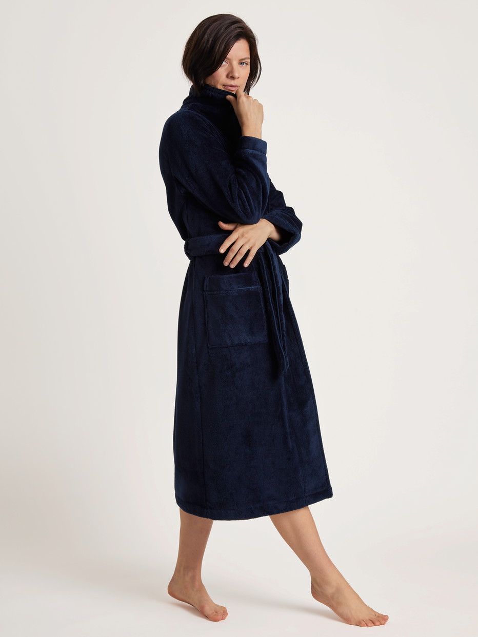 Women model is wearing Bathrobe made of Cotton in Blue, Unicoloured from the Cosy Shower series by CALIDA, Front view