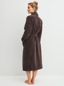 Women model is wearing Bathrobe 120 cm made of Cotton in Brown, Unicoloured from the Alpine LW series by CALIDA, Back view