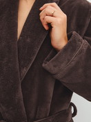 Women model is wearing Bathrobe 120 cm made of Cotton in Brown, Unicoloured from the Alpine LW series by CALIDA, Detail